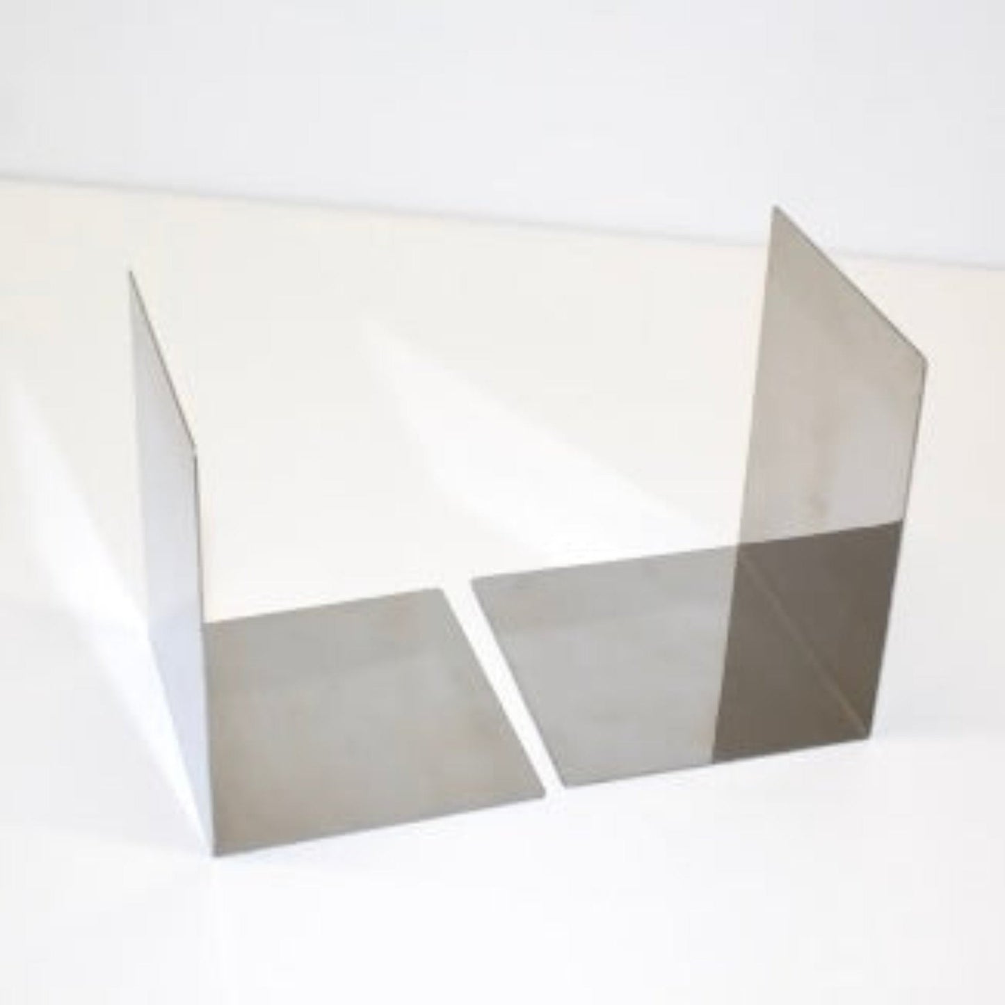  Chrome-colored metal Bookends by Another McDonald Design Buffalo, N.Y