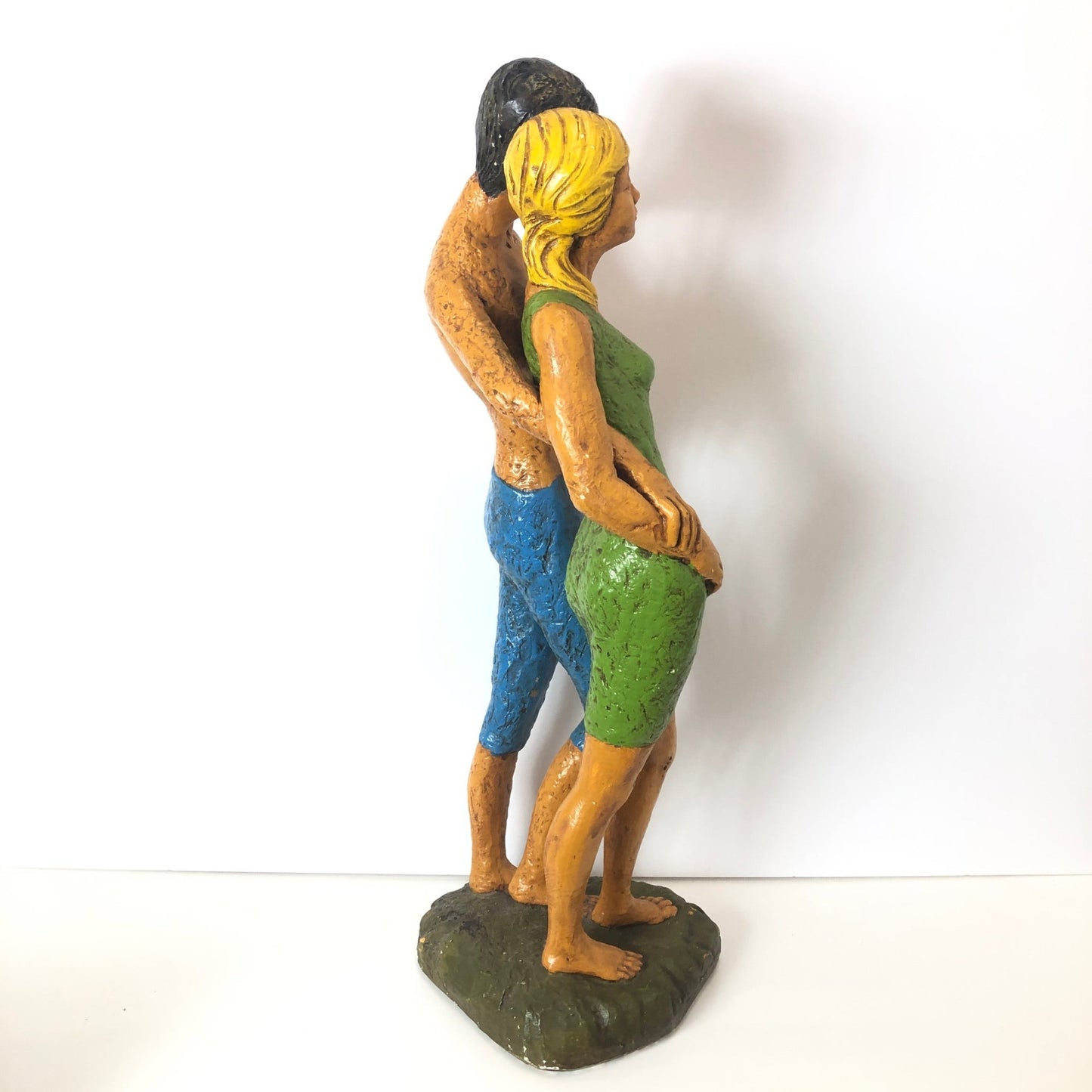 Loving beach couple Chalkware sculpture, side view.